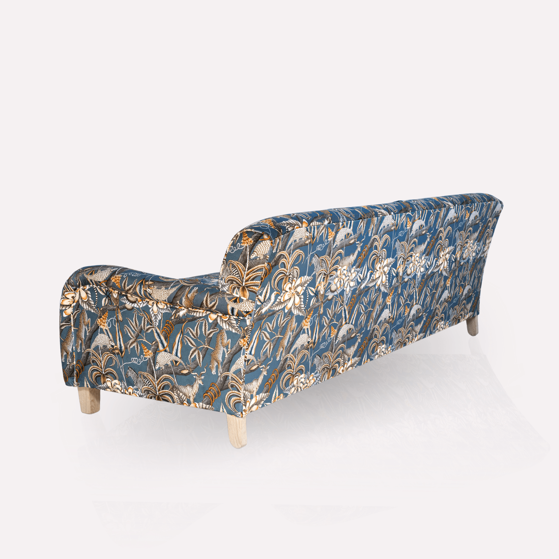 Showcases the rear detailing, ensuring that the sofa looks just as elegant from behind, perfect for open-plan spaces.