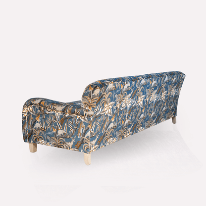 Showcases the rear detailing, ensuring that the sofa looks just as elegant from behind, perfect for open-plan spaces.