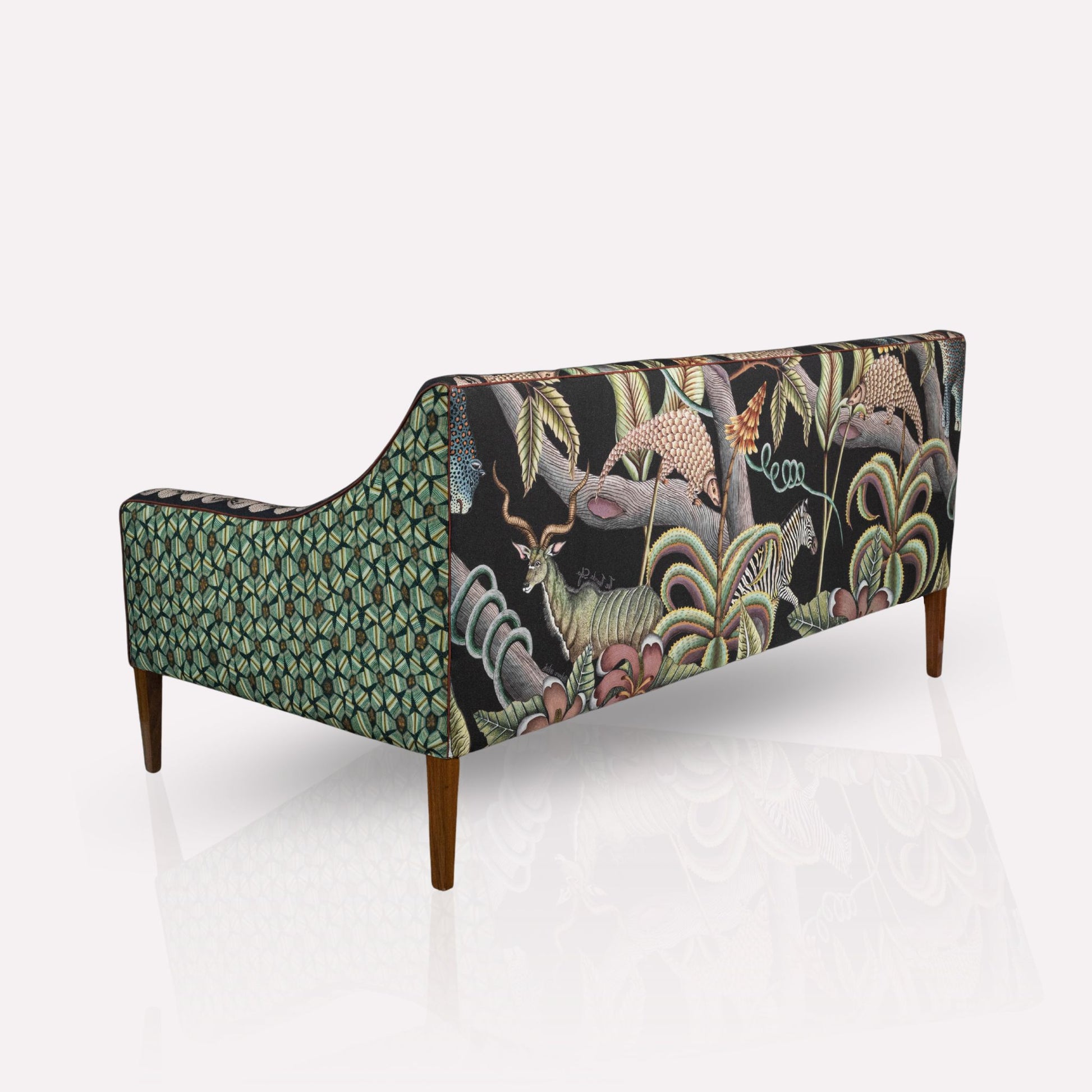 Side profile of the Ardmore Thanda Sofa Limited Edition, showing its deep seating and refined structure.