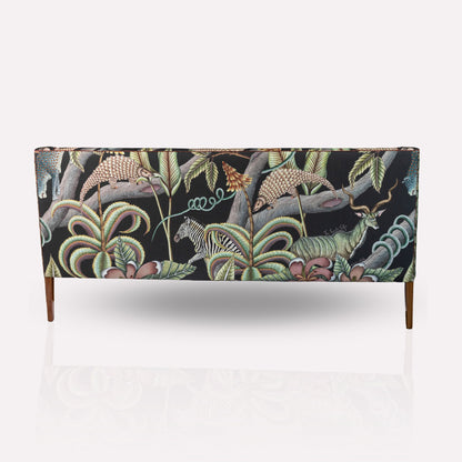 Close-up of the Ardmore Thanda Sofa Limited Edition’s fabric, capturing the vibrant hand-painted Pangolin Park motifs.