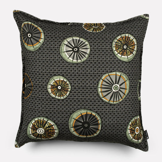A 50x50cm square cushion cover in Amasumpa Night fabric, featuring a deep charcoal base with intricate gold and bronze circular patterns.