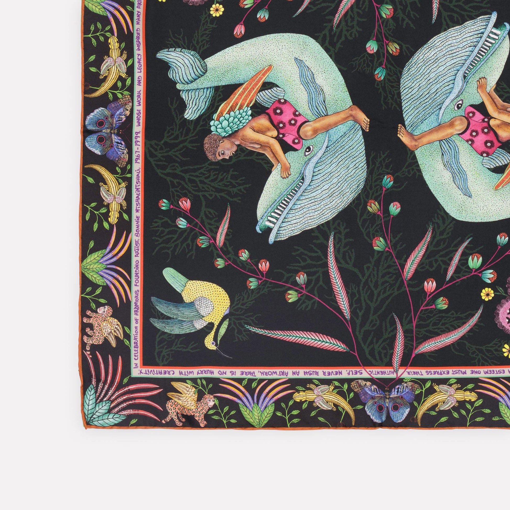 A zoomed-in view of the bird motifs and floral accents, showcasing the fine details and vibrant colours.