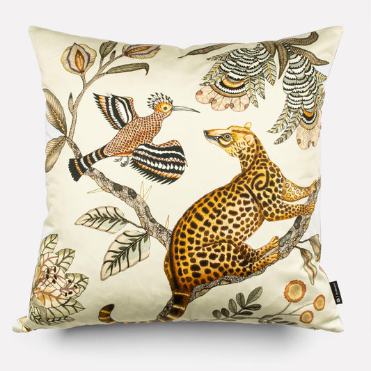 A 50x50cm cushion cover showcasing a light stone-coloured background with detailed illustrations of a leopard and birds amidst botanical elements.