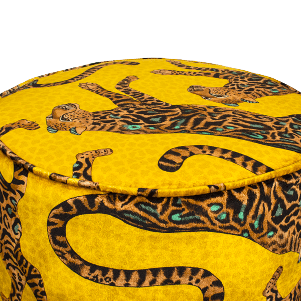 Close-up of the Ardmore Cheetah Kings Gold Velvet Pouffe, highlighting the embroidered cheetah patterns against the plush gold velvet fabric, showcasing fine craftsmanship.