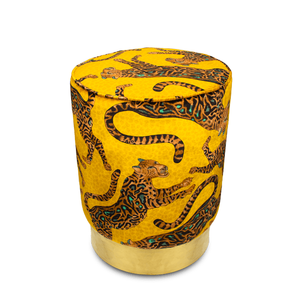 Luxurious Ardmore Cheetah Kings Gold Velvet Pouffe, featuring an opulent golden velvet fabric adorned with intricate black cheetah motifs, set on a gleaming brass base.