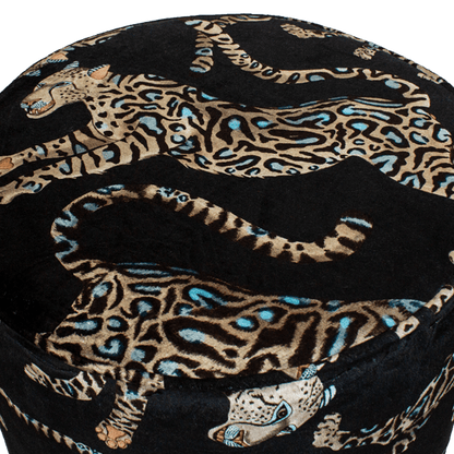 Close-up of the intricate golden cheetah embroidery on the Ardmore Cheetah Kings Starry Nights Velvet Pouffe, highlighting the fine craftsmanship and opulent fabric details.
