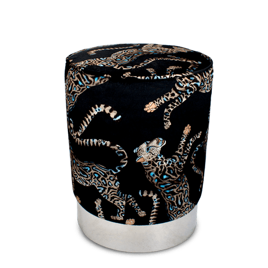 Luxurious Ardmore Cheetah Kings Starry Nights Velvet Pouffe, featuring a striking cheetah motif in shimmering gold on deep black velvet, elegantly perched on a sleek silver brass base.