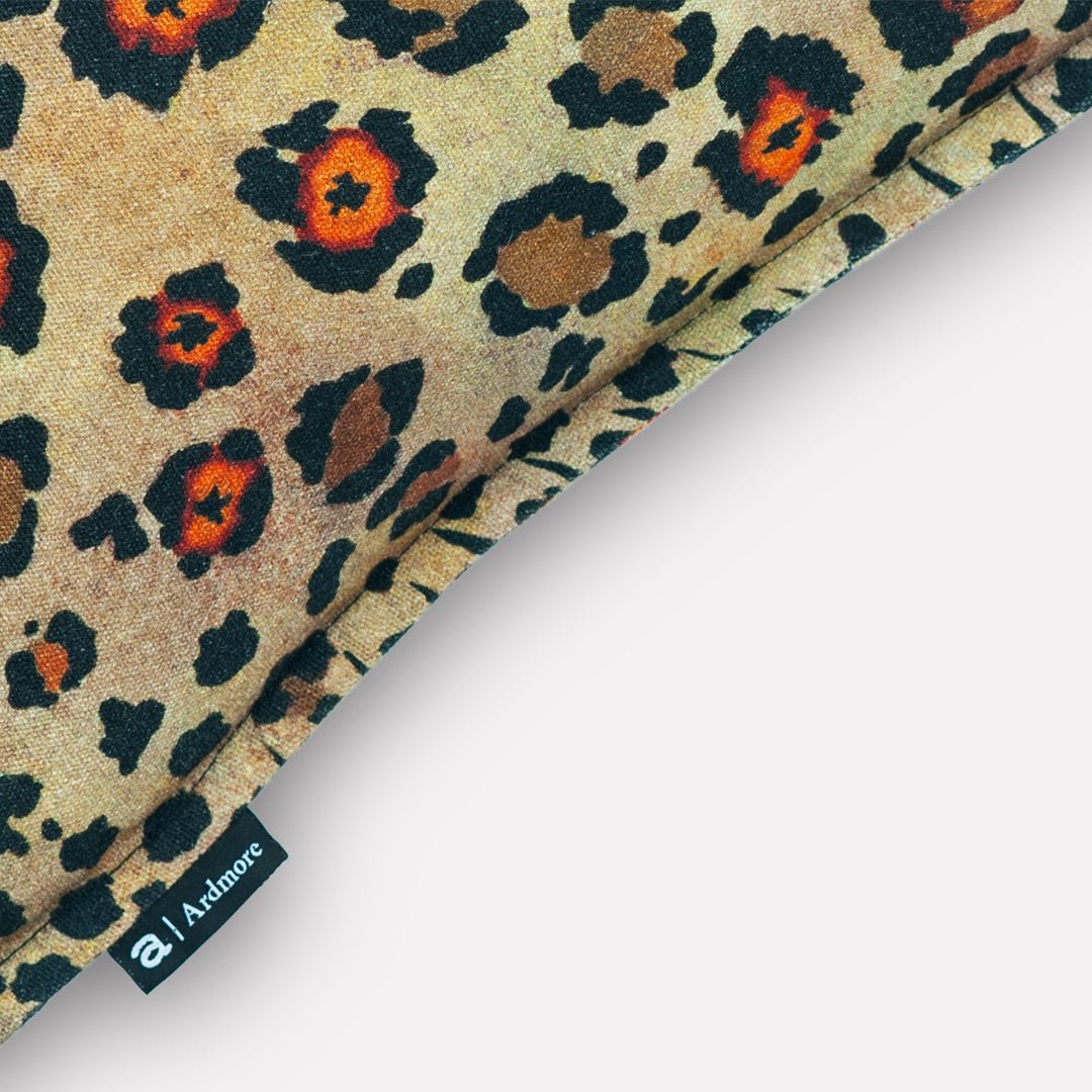 Close-up of the detailed leopard-print pattern on the Thanda Safari Spot Gold Cushion Cover, showcasing its luxurious texture and bold colours.