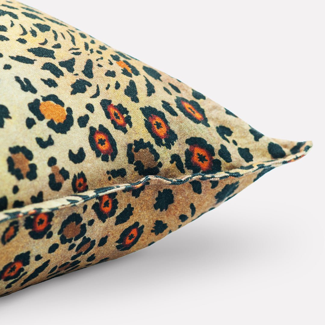 Close-up of the cushion's corner, highlighting the precise stitching and the vivid leopard-print design extending seamlessly.