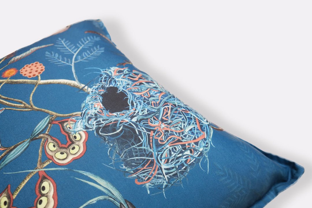 Side angle displaying the rich blue fabric and seamless pattern alignment of the cushion cover.