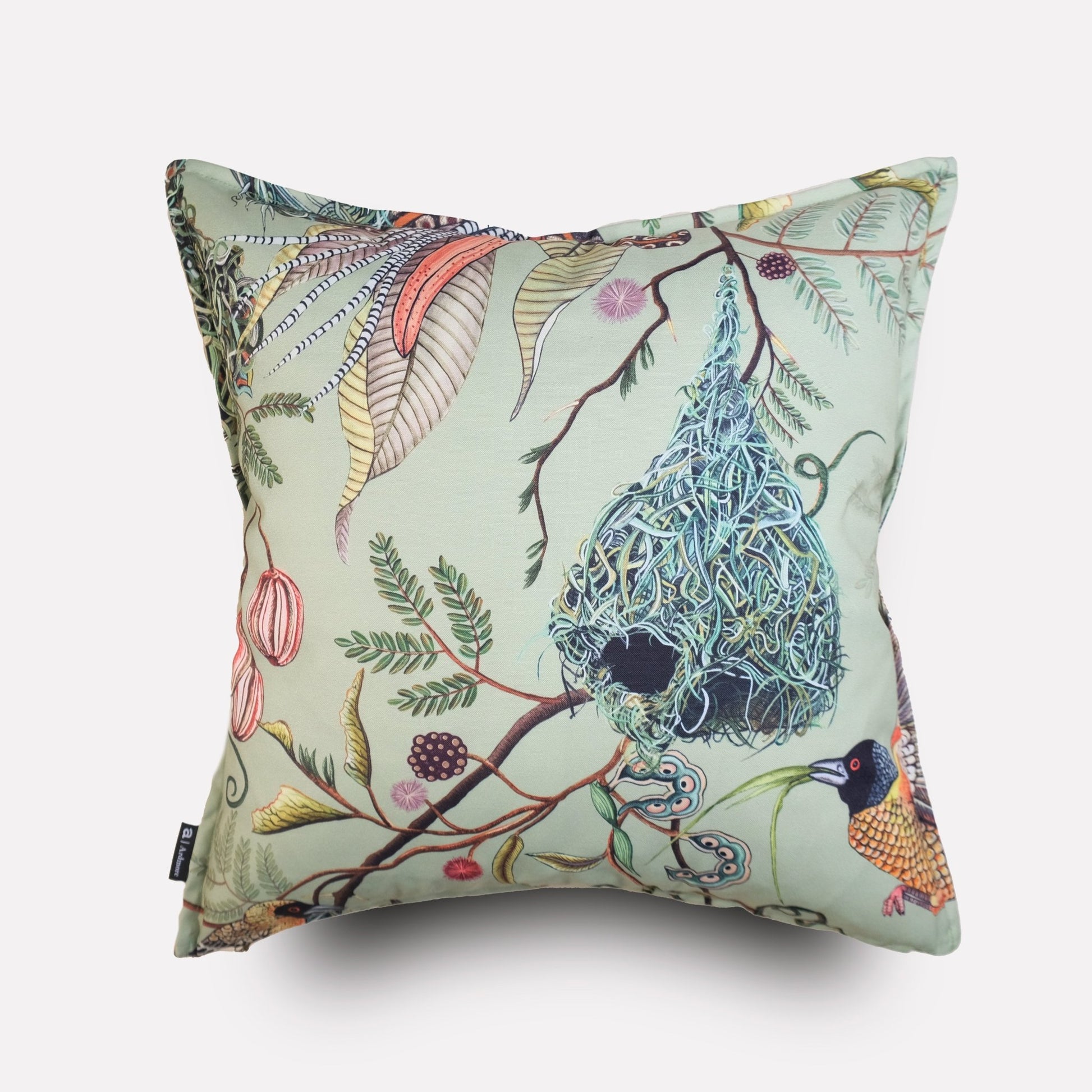 Angled view of the Thanda Nests Delta Outdoor Cushion Cover, showcasing its elegant nature-themed pattern and fabric texture.