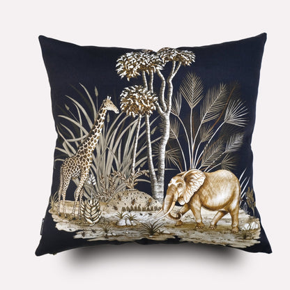 A closer view of the cushion, showcasing the detailed embroidery and artwork of the elephant amidst tall African plants, emphasising the high-quality craftsmanship.