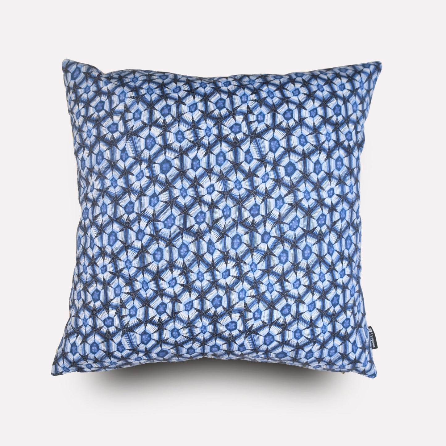 Front view of the Thanda Tortoise Tanzanite Cushion Cover, featuring an intricate blue and white geometric pattern inspired by the leopard tortoise’s shell.