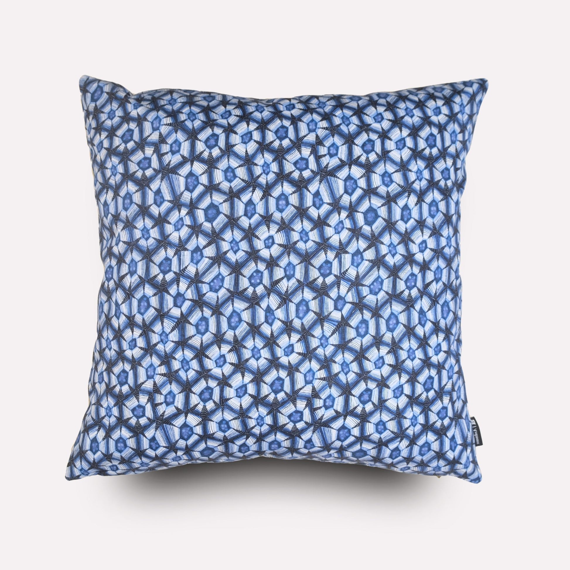 Front view of the Thanda Tortoise Tanzanite Cushion Cover, featuring an intricate blue and white geometric pattern inspired by the leopard tortoise’s shell.