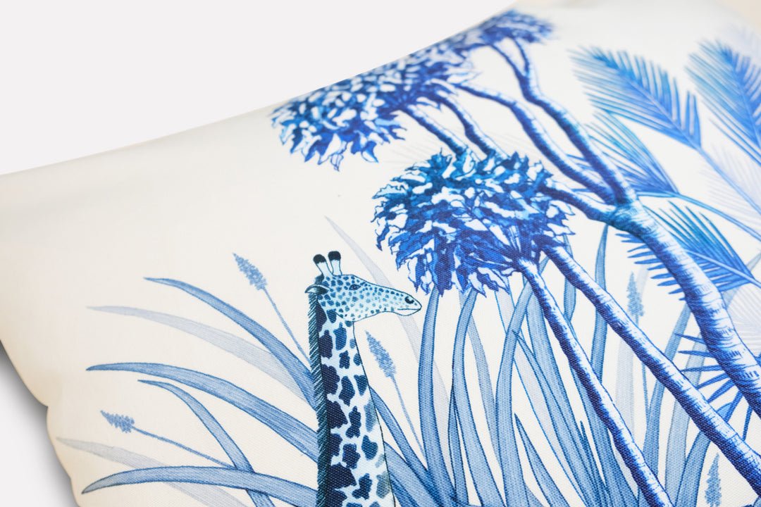 A close-up of the hand-drawn elephant artwork, emphasising the cushion’s fine design and rich Tanzanite blue hues.
