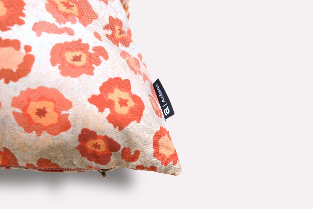 Close-up side view of the Safari Spot Coral Cushion Cover, highlighting the intricate leopard-print pattern and fine stitching details.