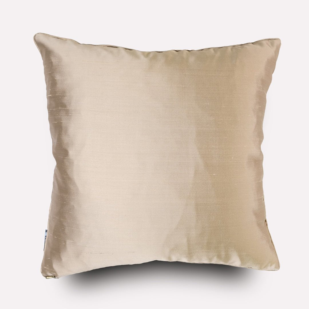 The reverse side of the cushion, displaying a plain silk fabric in a neutral beige shade with a smooth finish.