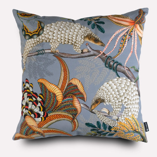 Front view of the Thanda Pangolin in Ash Velvet Cushion Cover, showcasing the detailed pangolin design in earthy tones on a soft grey velvet fabric.