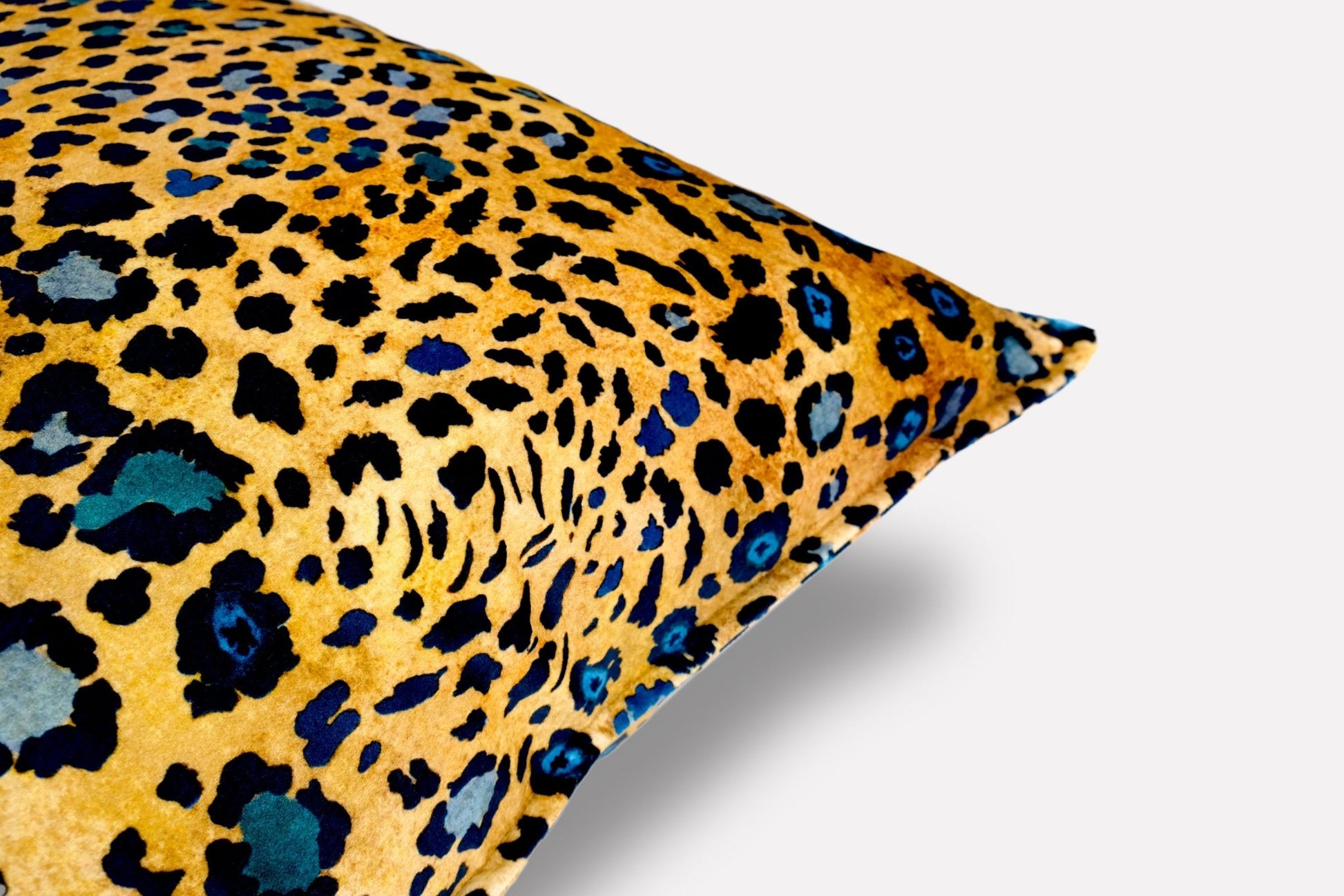 Side view of the Safari Spot Midnight Velvet Cushion Cover, highlighting the luxurious finish and seamless design.