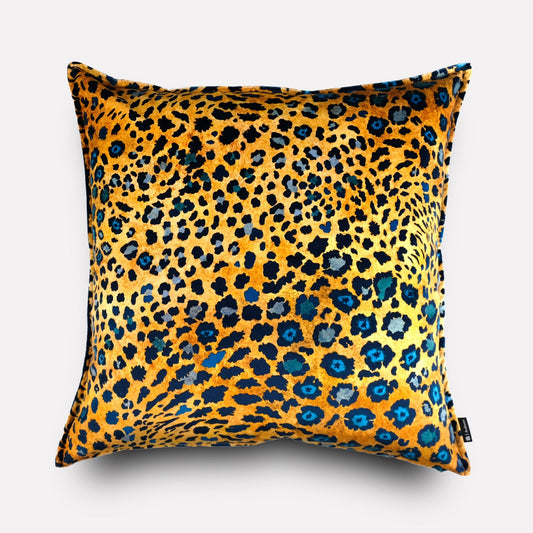 Front view of the Safari Spot Midnight Velvet Cushion Cover, featuring a striking leopard-print design in bold midnight blue and gold tones.