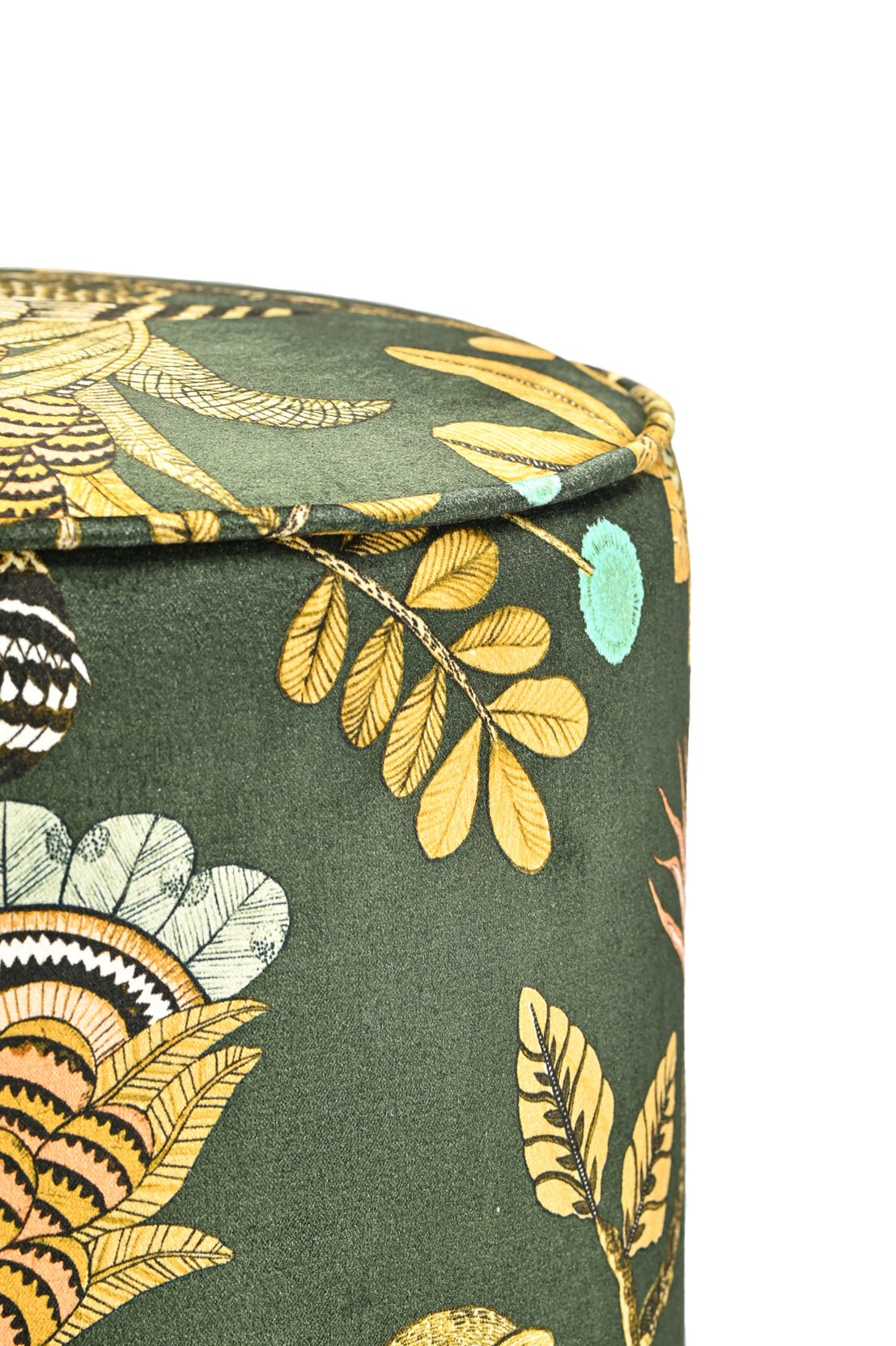 Side view close-up of the Ardmore Camp Critter Dusk Velvet Pouffe, showcasing the luxurious fabric texture and detailed golden embroidery of African-inspired wildlife designs.