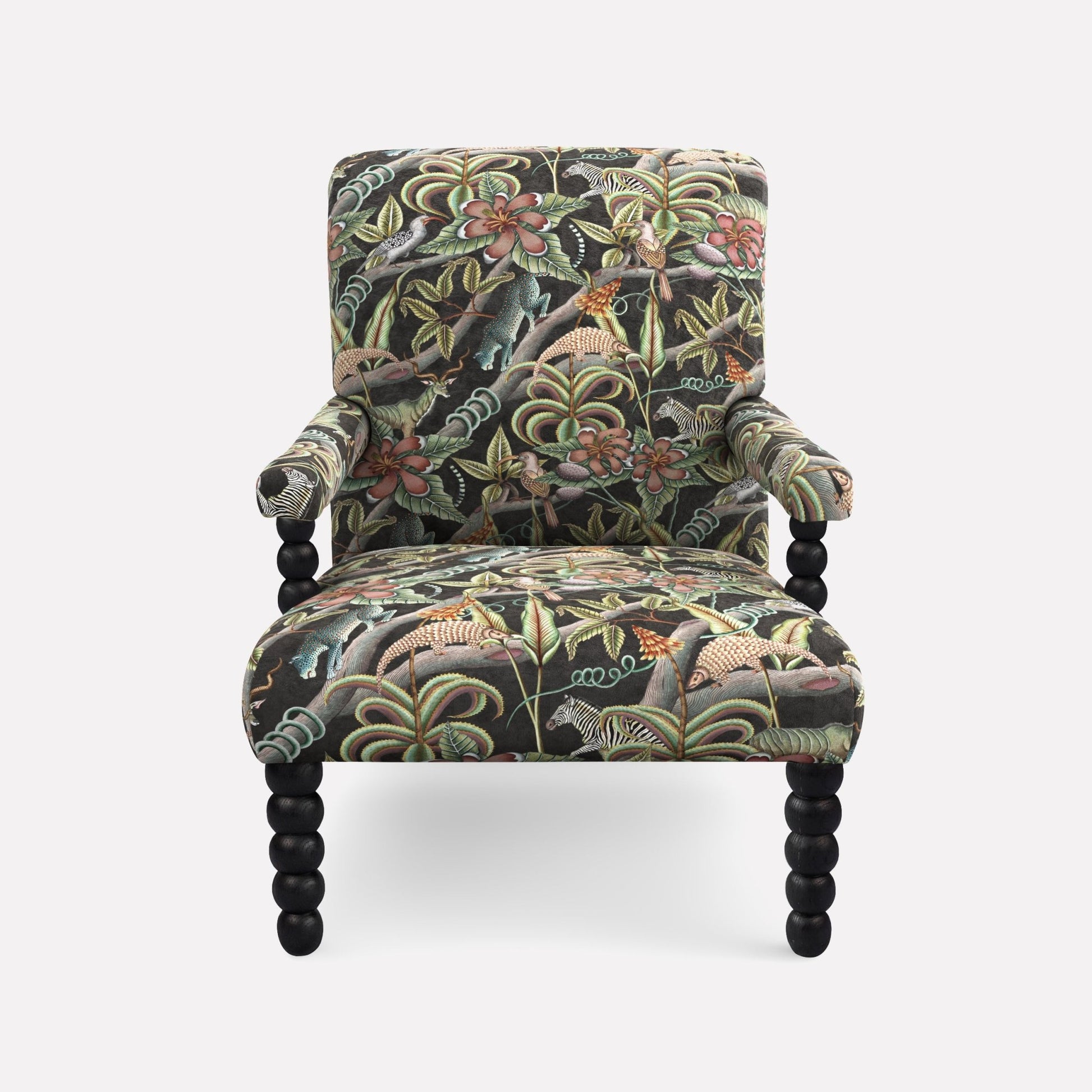 Front-facing view of the Ardmore Kudu Pod Chair in Pangolin Park Night Velvet, showcasing its bold design, high backrest, and rich patterned fabric.
