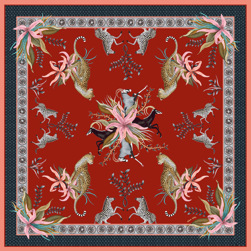 A striking square tablecloth in deep red, intricately decorated with sable, zebras, leopards, and lush floral elements, framed by an ornate border.