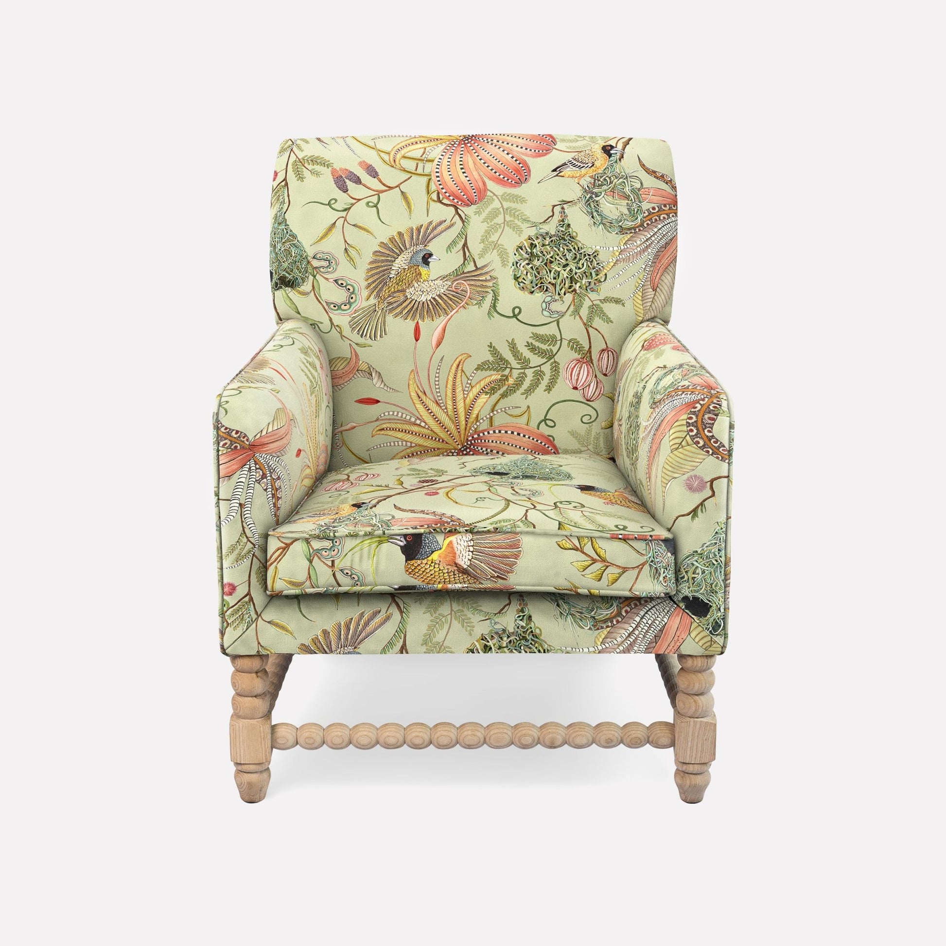The Ardmore Lucky Bean Chair, upholstered in Thanda Nests Delta Linen, features a delicate fusion of botanical and wildlife-inspired patterns. Its plush cushioning, high backrest, and sculpted armrests create a perfect balance of luxury and comfort, making it an ideal addition to elegant interiors.