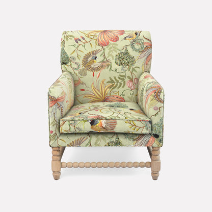 The Ardmore Lucky Bean Chair, upholstered in Thanda Nests Delta Linen, features a delicate fusion of botanical and wildlife-inspired patterns. Its plush cushioning, high backrest, and sculpted armrests create a perfect balance of luxury and comfort, making it an ideal addition to elegant interiors.