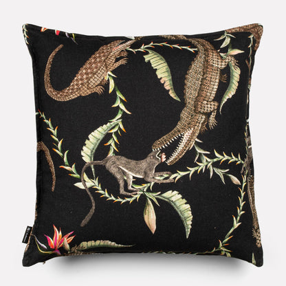 Back view of the River Chase Night Linen cushion cover, showcasing the crocodile and floral motifs with precise stitching and dark hues.