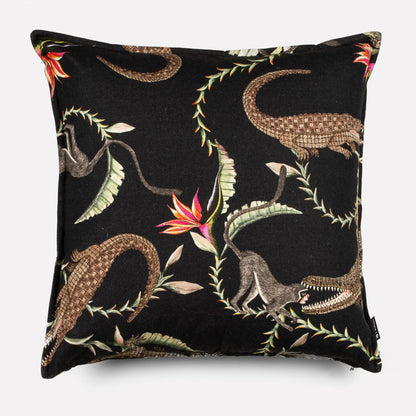 Front view of the River Chase Night Linen cushion cover featuring crocodile and floral patterns on a sleek black background.
