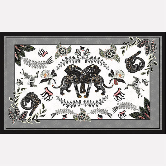 A flat-lay view of the Royal Leopard Tablecloth in Charcoal on Natural Linen, featuring an intricate black-and-white elephant and leopard motif with botanical elements.