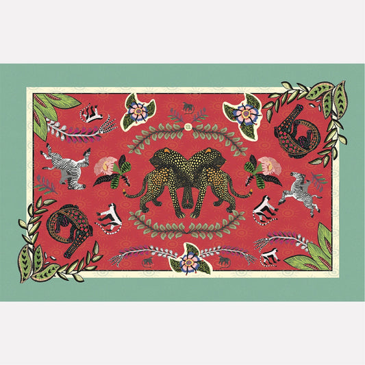 A flat-lay view of the Royal Leopard Tablecloth in Sunset, showcasing an intricate design featuring leopards, floral elements, and a green border.
