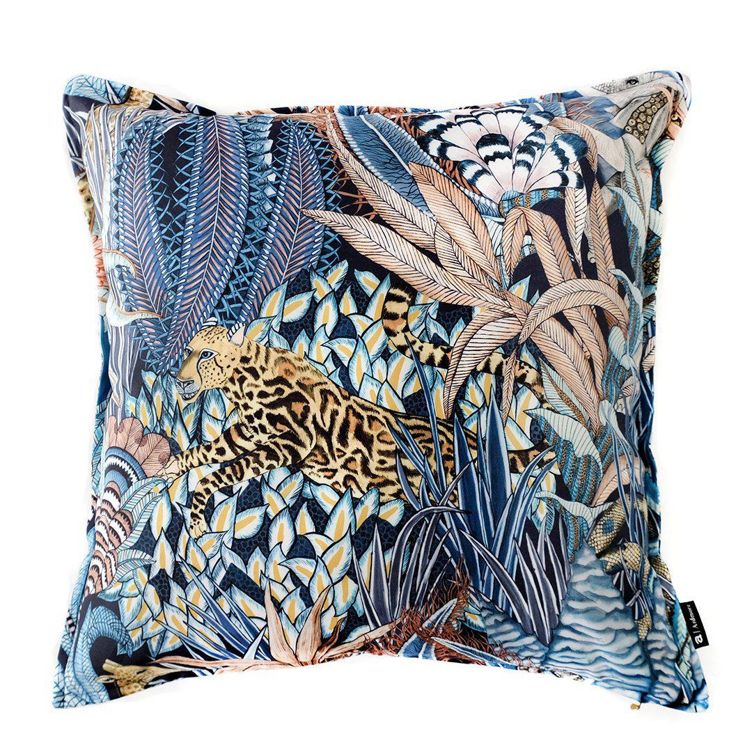 50x50cm double-sided cushion cover in Sabie Forest Dawn fabric, featuring an intricate design of exotic plants, a leopard, and a giraffe in shades of blue, beige, and gold.
