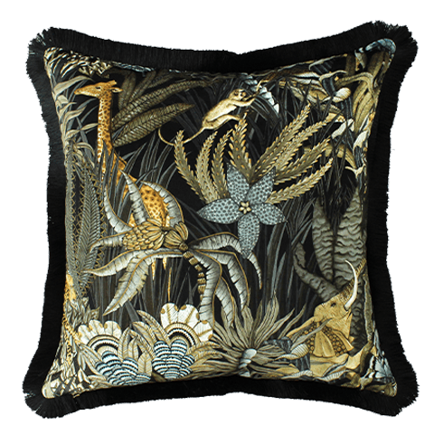 Close-up of the Sabie Forest Moonlight cushion cover, showcasing a giraffe and other wildlife amid lush jungle leaves in golden and green tones on a dark velvet background.