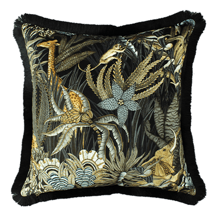 Close-up of the Sabie Forest Moonlight cushion cover, showcasing a giraffe and other wildlife amid lush jungle leaves in golden and green tones on a dark velvet background.