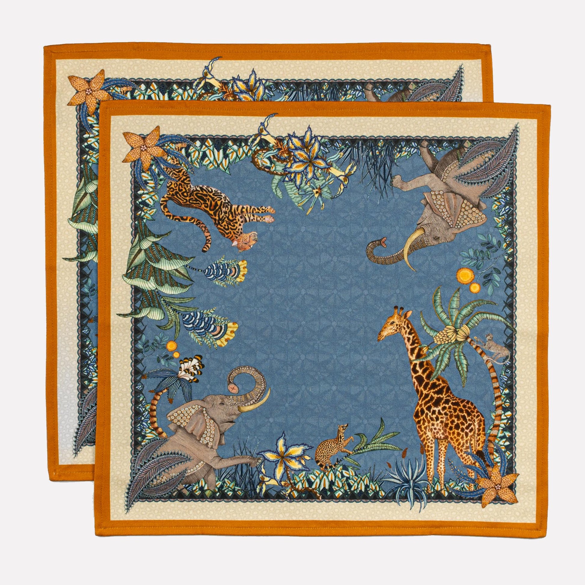 A stack of Ardmore Design Sabie Forest napkins in Tanzanite, elegantly arranged to display the detailed border and artistic African-inspired prints.