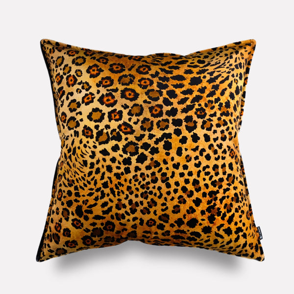 Front view of the Safari Spot Gold Velvet Cushion Cover, featuring a luxurious leopard-print design in vibrant gold tones.