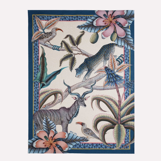 A beautifully designed tea towel featuring an intricate African wildlife motif with hornbills, kudus, and leopards, set against a rich blue-toned background.