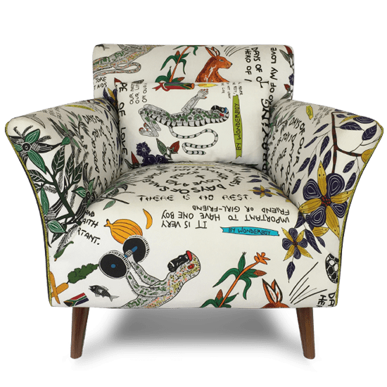 A straight-on shot of the Ardmore Wonderboy Occasional Chair, upholstered in a vibrant fabric featuring the narrative artwork of Wonderboy Nxumalo, showcasing African heritage and storytelling through intricate illustrations and text.