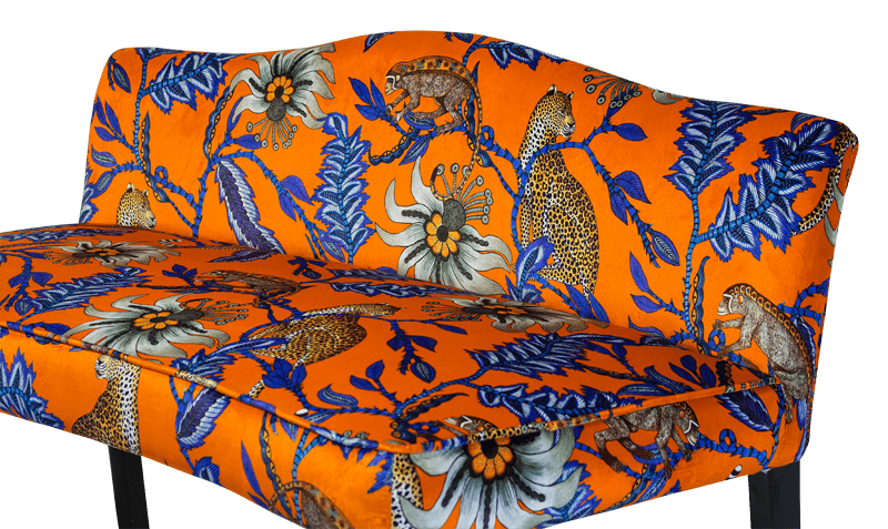 A side view of the bench, displaying its refined proportions, sleek modern legs, and the way the fabric wraps seamlessly around the contours of the seat.