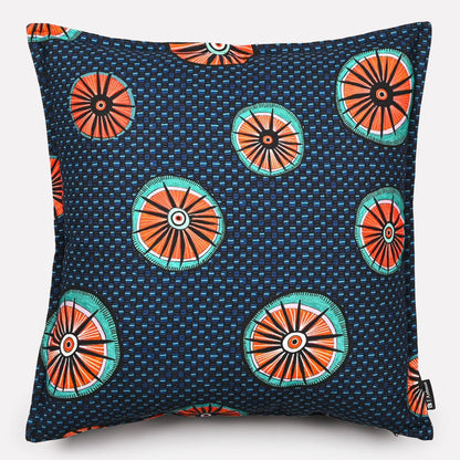 A 50x50cm square cushion cover in Amasumpa Royal fabric, featuring a deep navy base with bold circular patterns in orange, turquoise, and white.