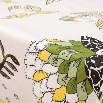 A close-up showcasing the intricate bird and fynbos design, bringing out the natural theme of the tablecloth.