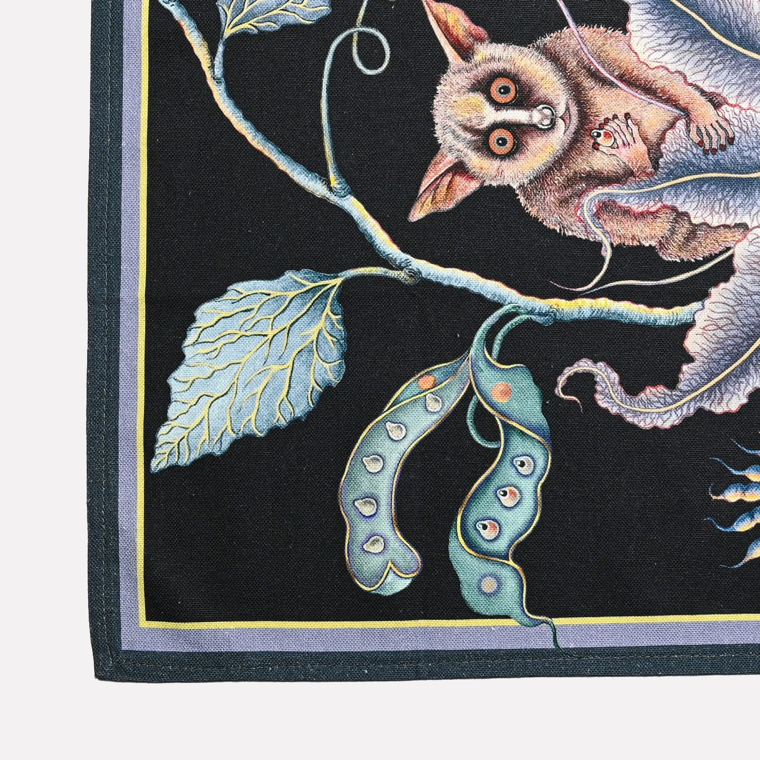 A detailed section showcasing the artistic representation of bush babies perched among delicate flowers and leaves.