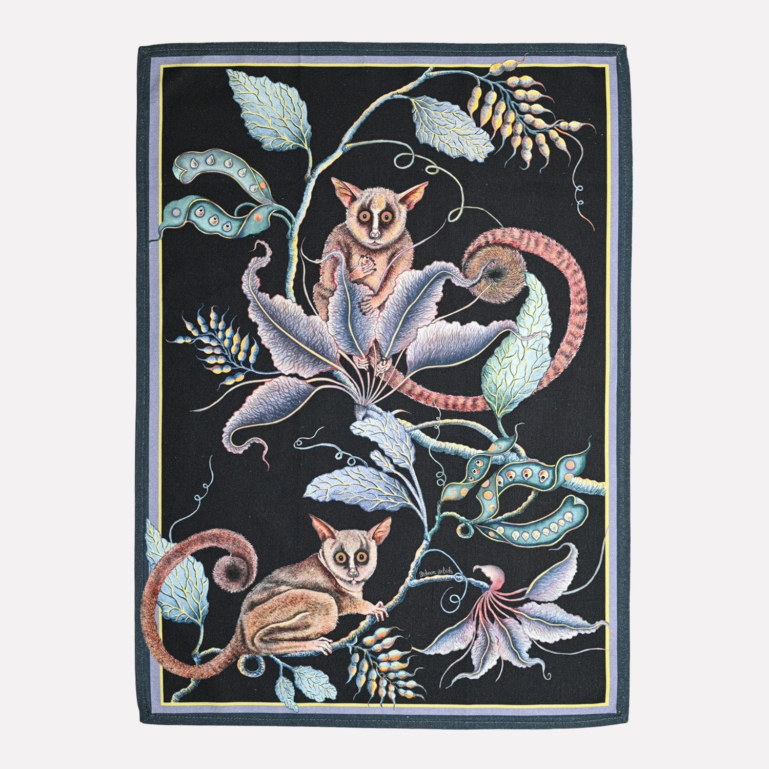 A luxurious tea towel featuring an intricate nighttime scene of bush babies and exotic foliage, set against a deep black background with elegant pastel details.