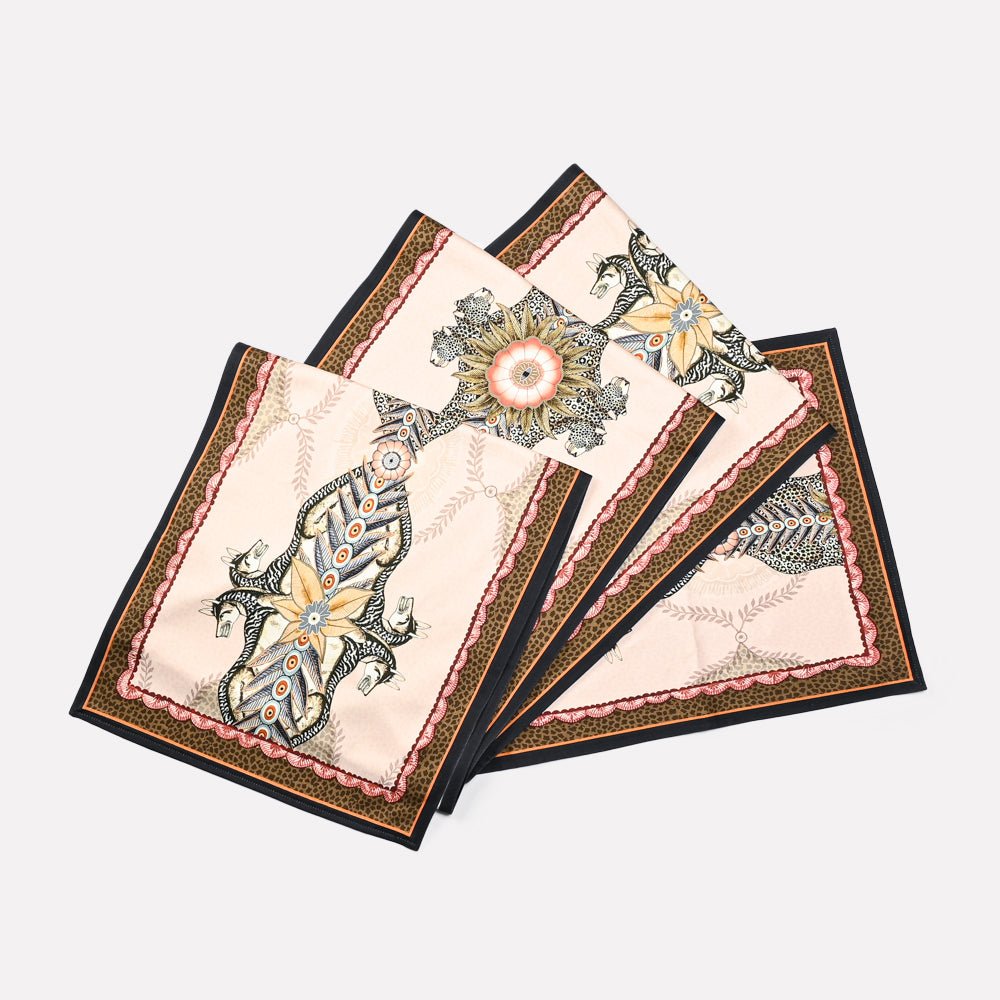 A set of Ardmore's Bush Bandits Table Runners in a neutral stone colour, adorned with intricate patterns of leopards and jackals.