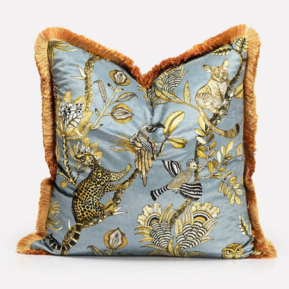 A perspective image showcasing the cushion’s luxurious fabric texture and intricate design, accentuated by the soft fringe border.