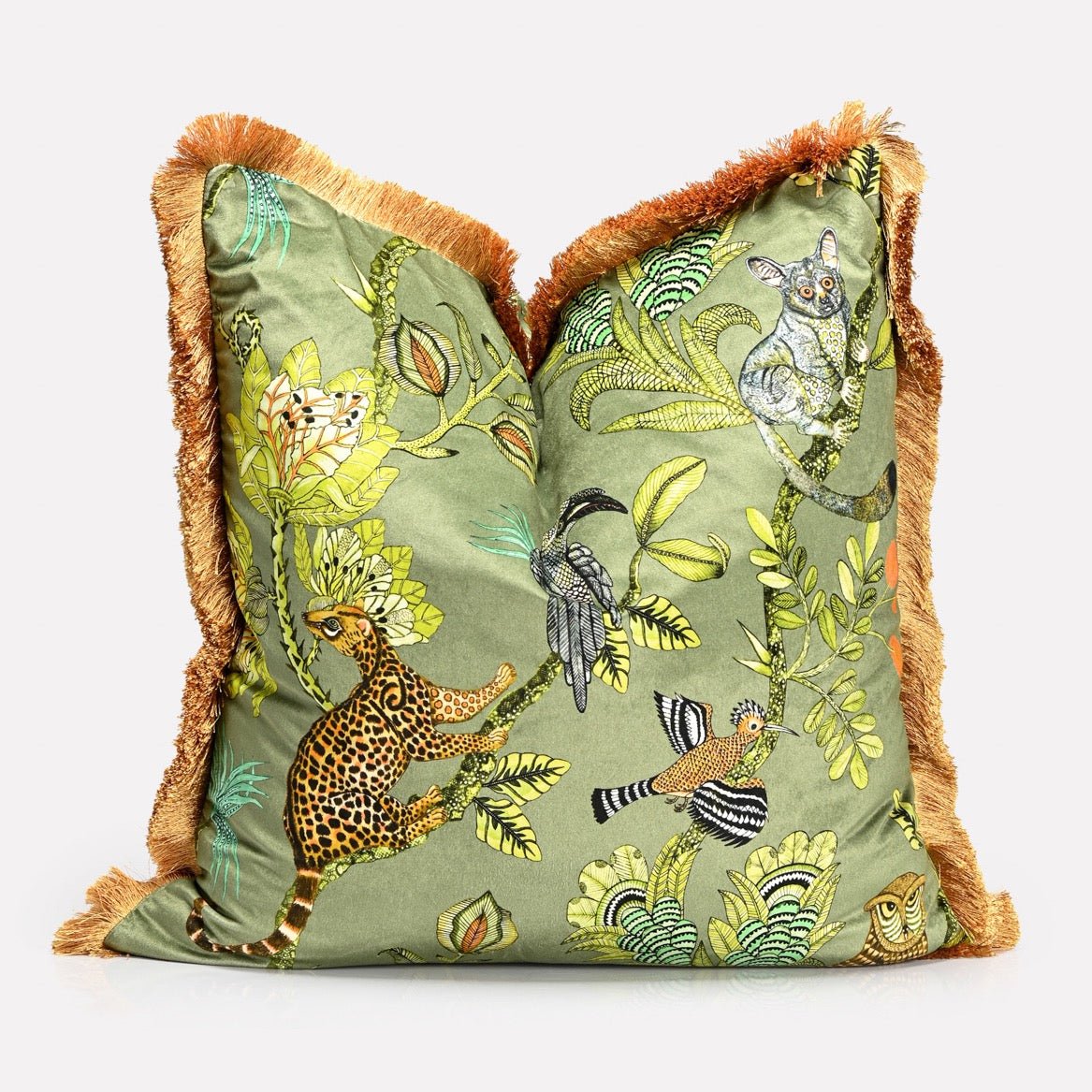 A side perspective showcasing the cushion’s luxurious texture, rich colour palette, and the detailed design wrapping around the edges.