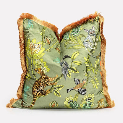A side perspective showcasing the cushion’s luxurious texture, rich colour palette, and the detailed design wrapping around the edges.