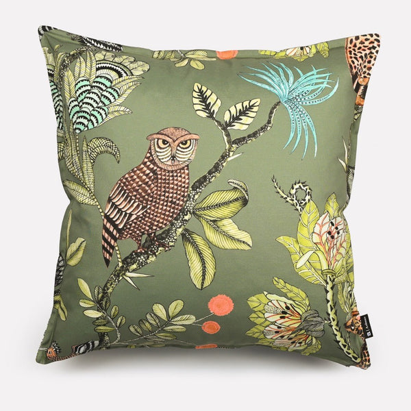 A 50x50cm cushion cover in muted olive green, adorned with an intricate wildlife print featuring an owl perched on a branch amidst lush foliage.
